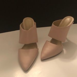Nude colored pumps